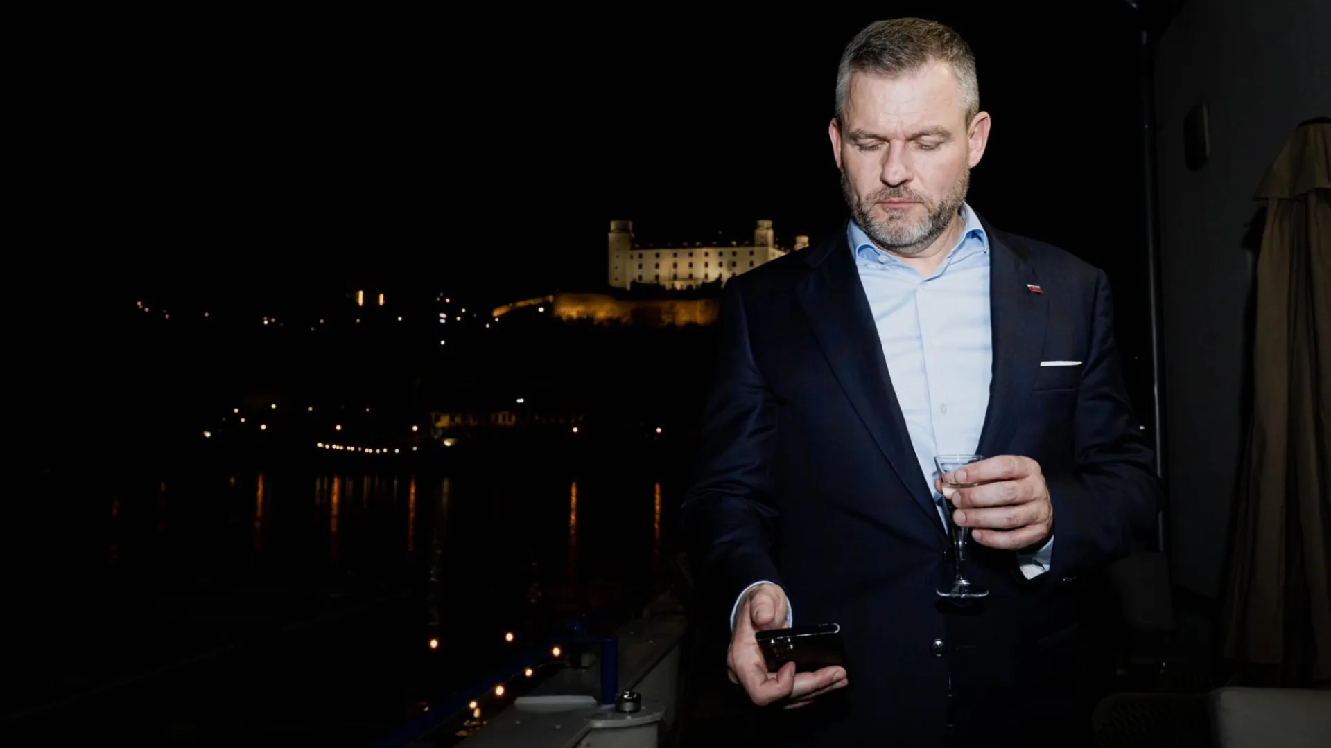 In the archive photo, Slovak president-elect Peter Pellegrini reads congratulations that arrived on his mobile phone at the election headquarters. 